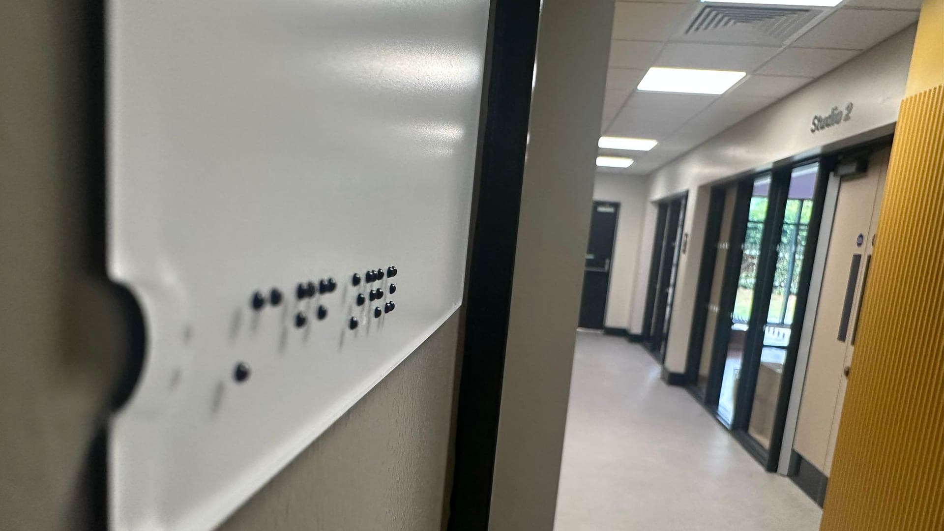 MyActive Leek room signage — braille detail