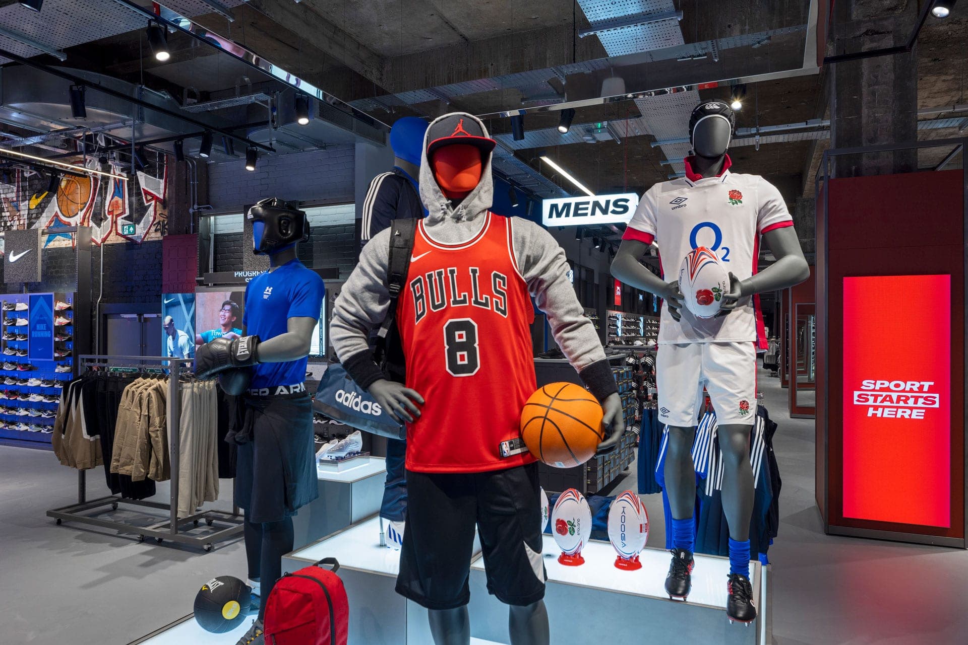 Sports Direct store interior with branded mannequins and Sport Starts Here signage